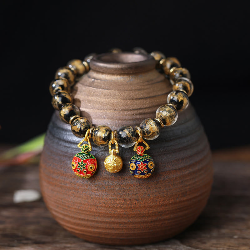 Bracelet spirituel avec bête avaleuse d'or et perles Liuli