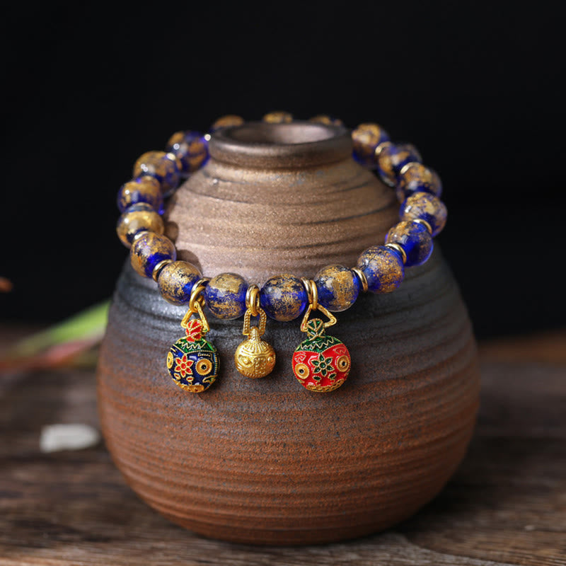 Bracelet spirituel avec bête avaleuse d'or et perles Liuli