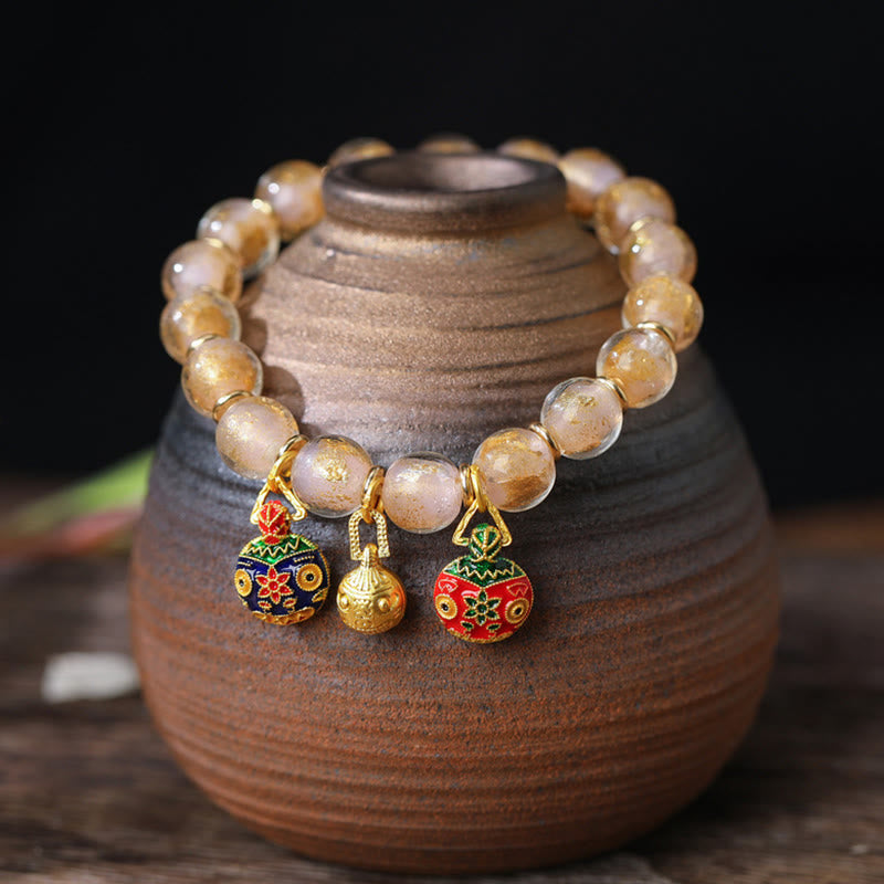 Bracelet spirituel avec bête avaleuse d'or et perles Liuli