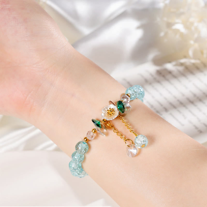 Bracelet spirituel en perles de verre avec breloque fleur pour la protection