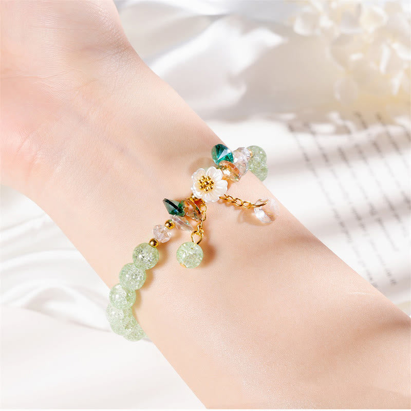 Bracelet spirituel en perles de verre avec breloque fleur pour la protection