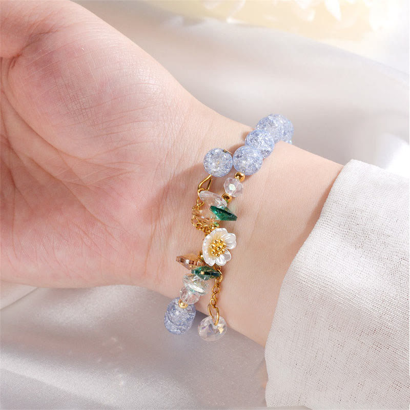 Bracelet spirituel en perles de verre avec breloque fleur pour la protection