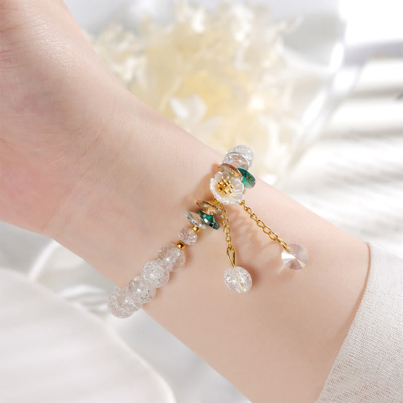 Bracelet spirituel en perles de verre avec breloque fleur pour la protection