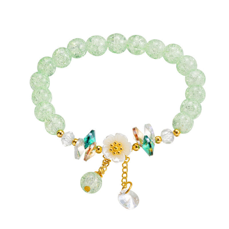 Bracelet spirituel en perles de verre avec breloque fleur pour la protection