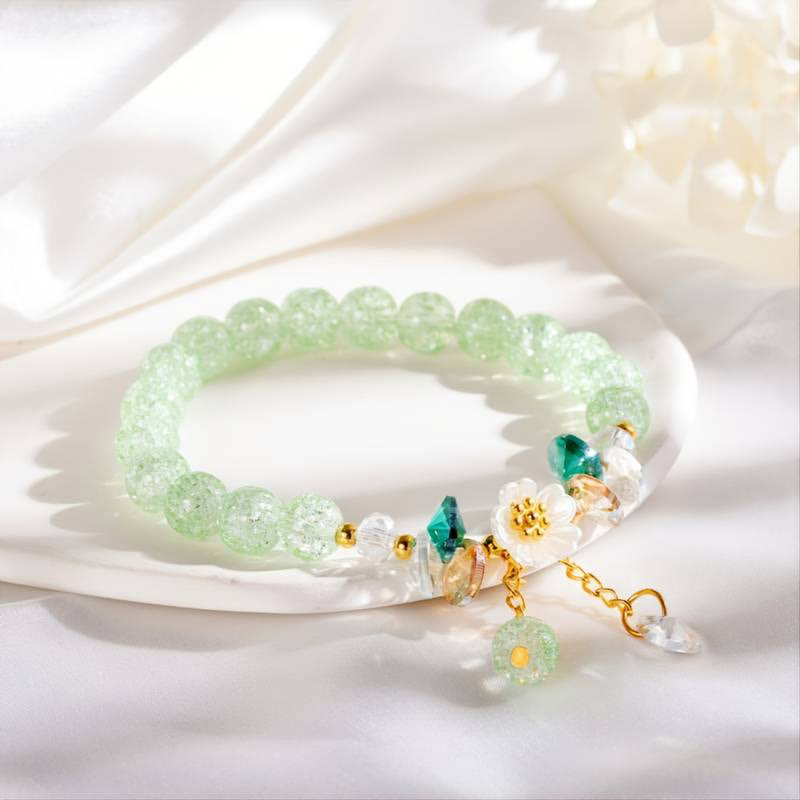Bracelet spirituel en perles de verre avec breloque fleur pour la protection