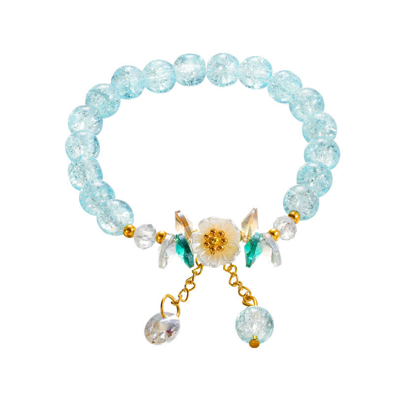 Bracelet spirituel en perles de verre avec breloque fleur pour la protection
