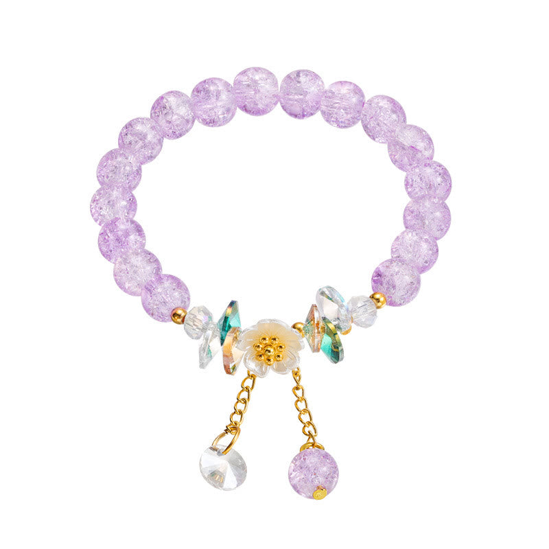 Bracelet spirituel en perles de verre avec breloque fleur pour la protection