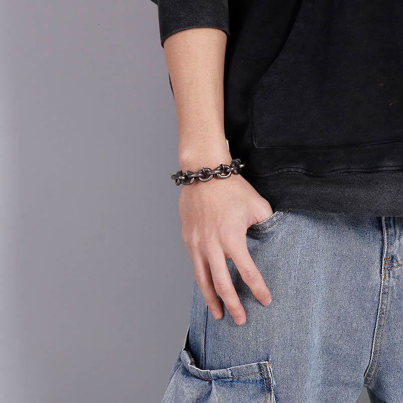 Bracelet spirituel en acier titane à rivets carrés pour l'équilibre