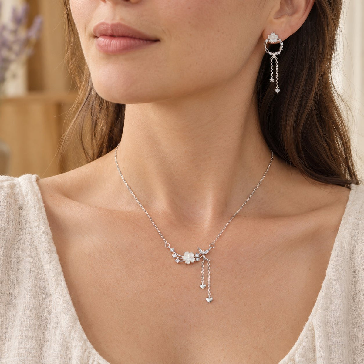 925 Sterling Silver Flower Butterfly Love Necklace Set, worn on the neck by a woman