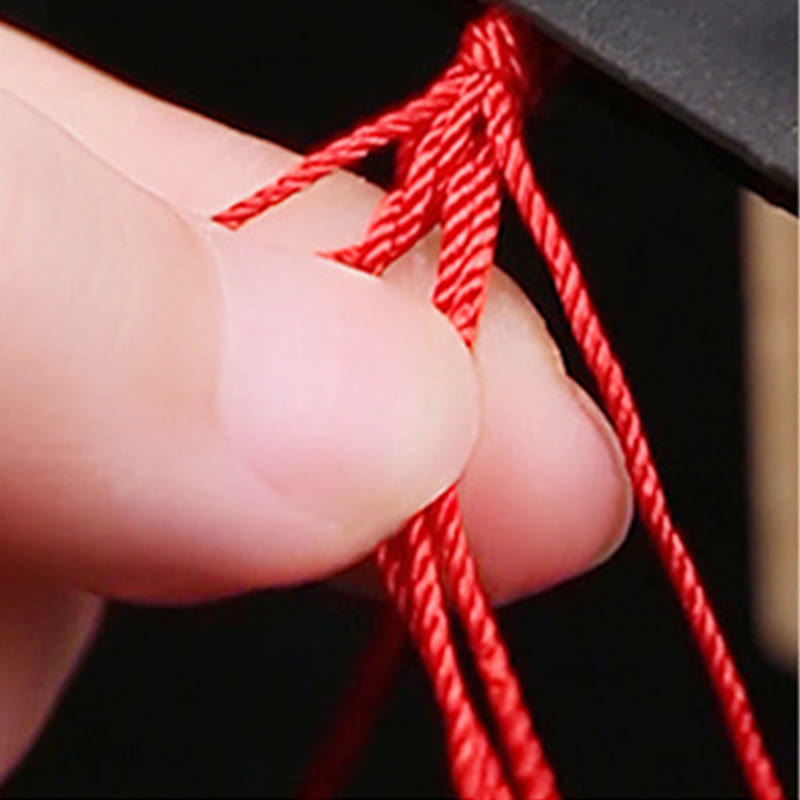 Bracelet en argent sterling avec cordon rouge et vert et gousse de lotus