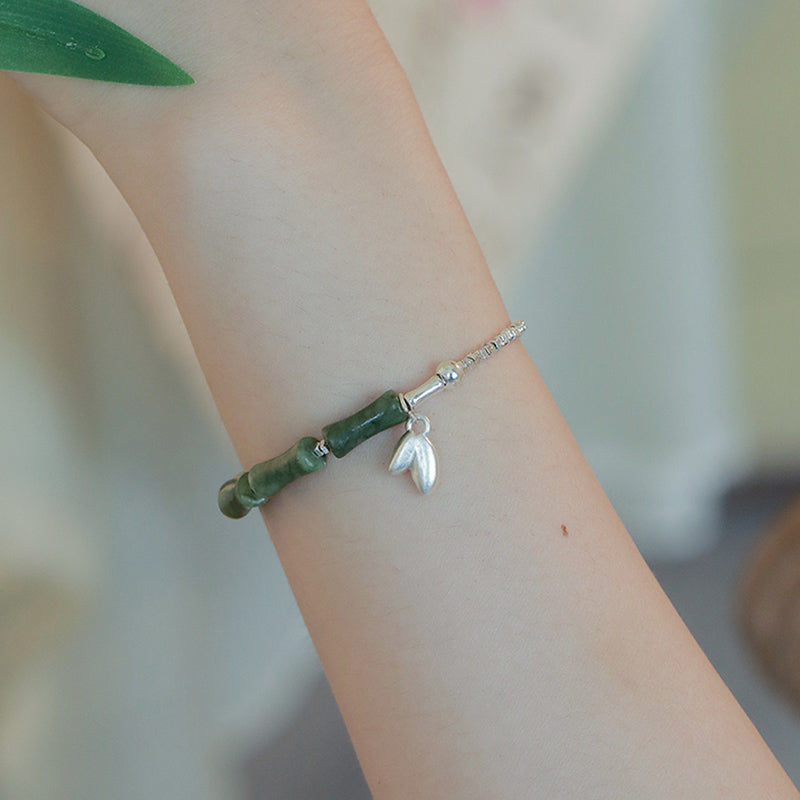 Bracelet spirituel en argent sterling et bambou péridot pour la chance