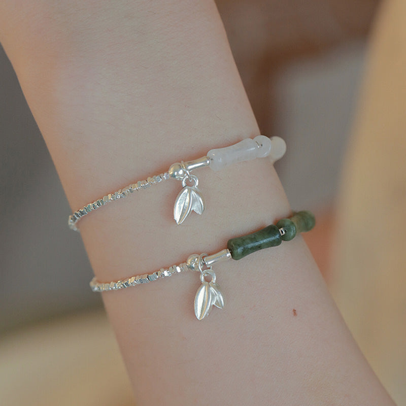Bracelet spirituel en argent sterling et bambou péridot pour la chance