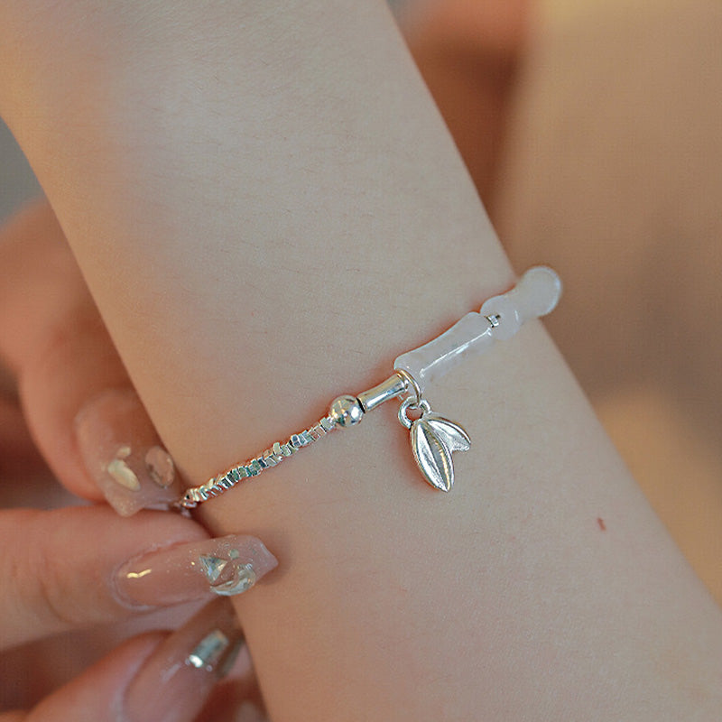 Bracelet spirituel en argent sterling et bambou péridot pour la chance