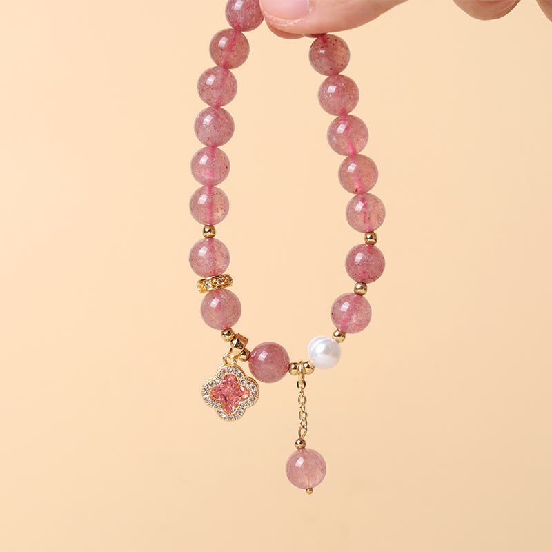 Bracelet d'amour en perles de quartz fraise et trèfle à quatre feuilles