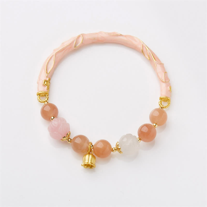 Bracelet à breloques positives en pierre de soleil et jade de soie dorée