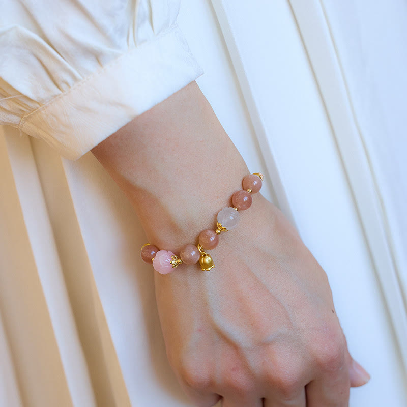 Bracelet à breloques positives en pierre de soleil et jade de soie dorée