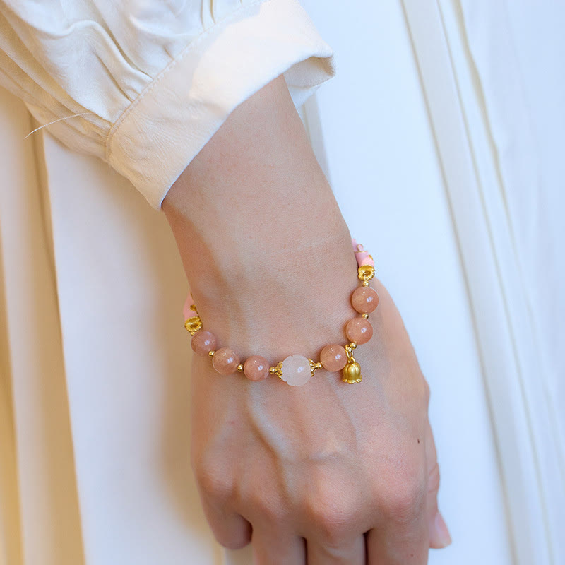 Bracelet à breloques positives en pierre de soleil et jade de soie dorée
