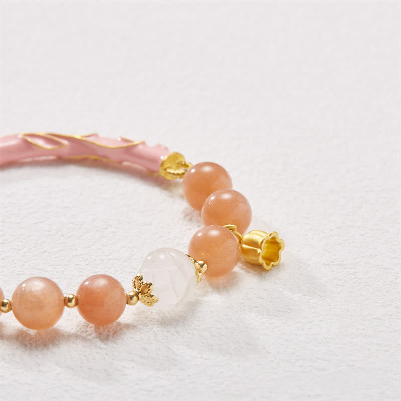 Bracelet à breloques positives en pierre de soleil et jade de soie dorée