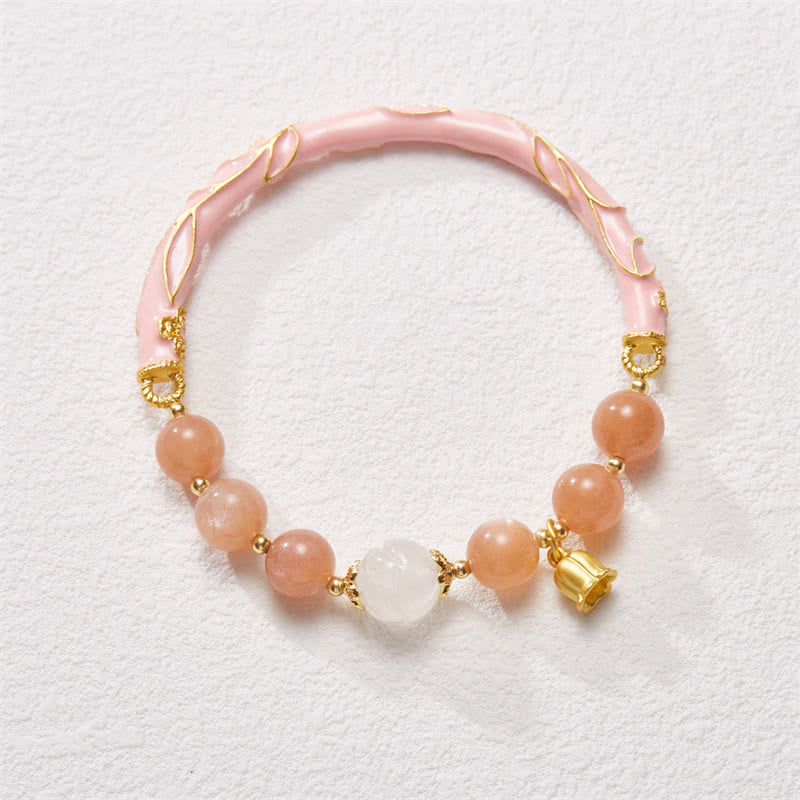 Bracelet à breloques positives en pierre de soleil et jade de soie dorée
