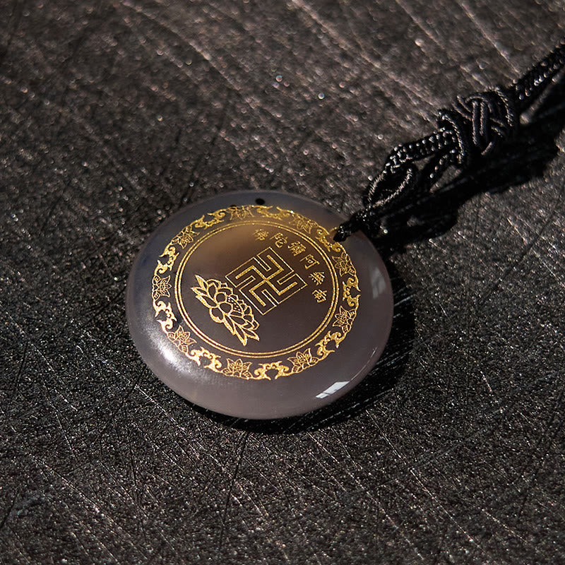 Collier de purification en obsidienne noire à motif de lotus svastika