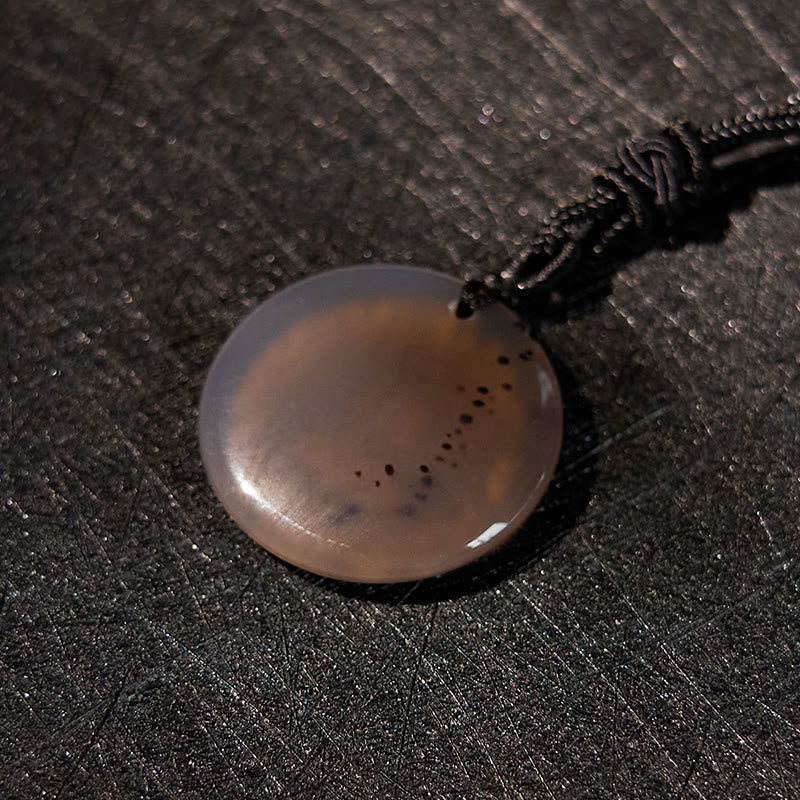 Collier de purification en obsidienne noire à motif de lotus svastika