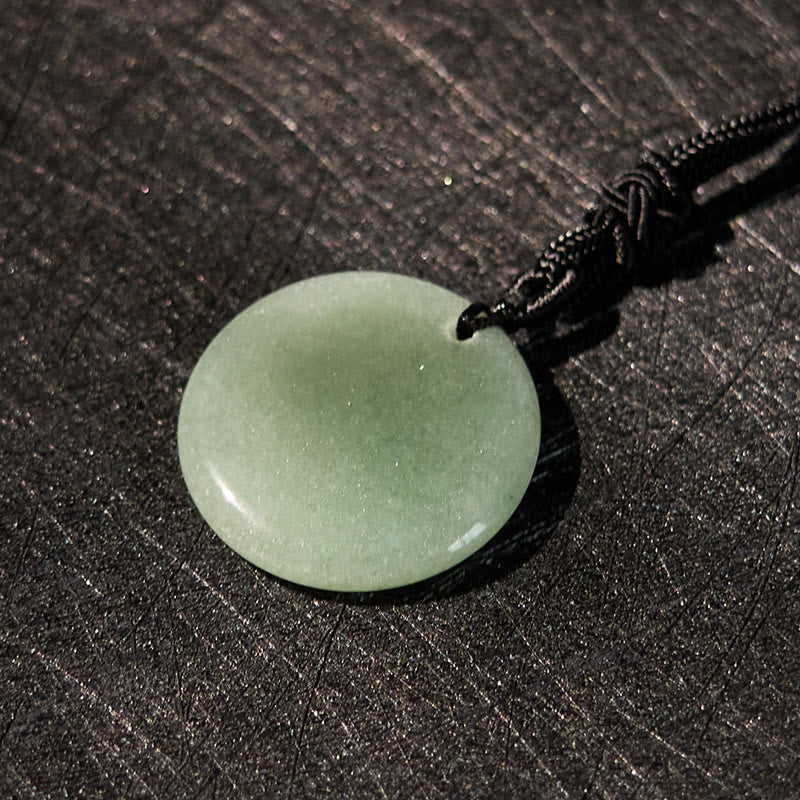 Collier de purification en obsidienne noire à motif de lotus svastika