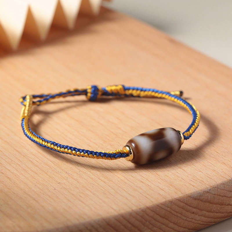 Bracelet spirituel en perles Dzi à trois yeux pour la chance et le bonheur