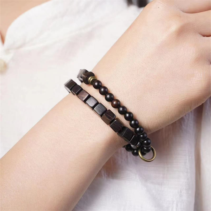 Bracelet spirituel double tour en bois d'ébène du Tibet pour la paix