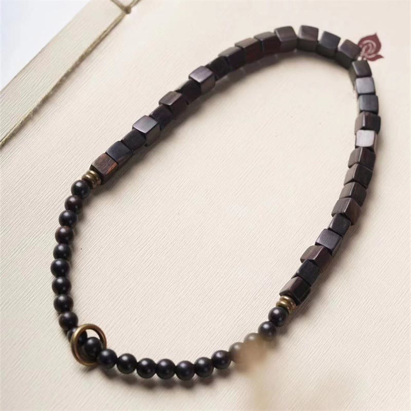 Bracelet spirituel double tour en bois d'ébène du Tibet pour la paix