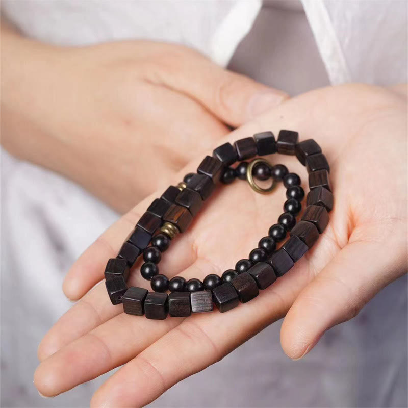 Bracelet spirituel double tour en bois d'ébène du Tibet pour la paix