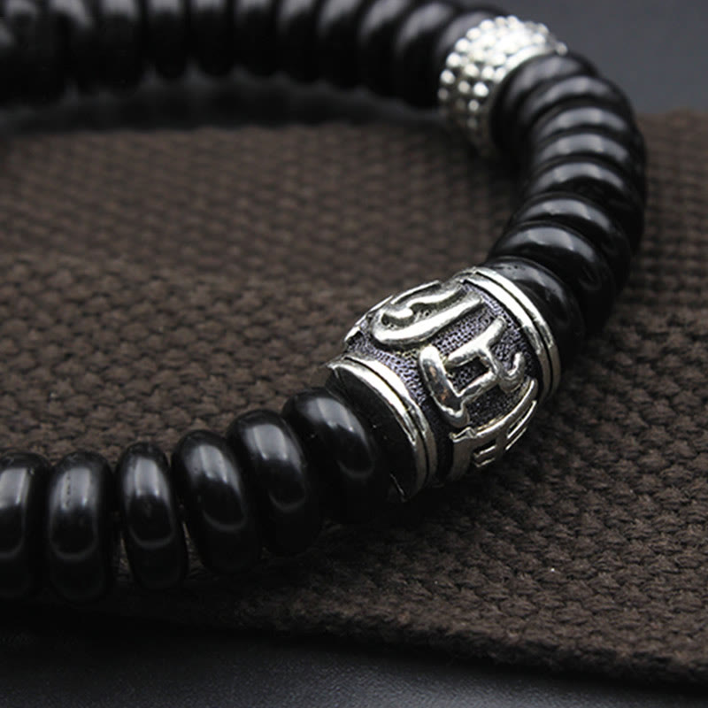 Bracelet tibétain en coquille de noix de coco Om Mani Padme Hum 14-16 cm
