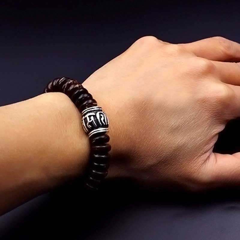 Bracelet tibétain en coquille de noix de coco Om Mani Padme Hum 14-16 cm