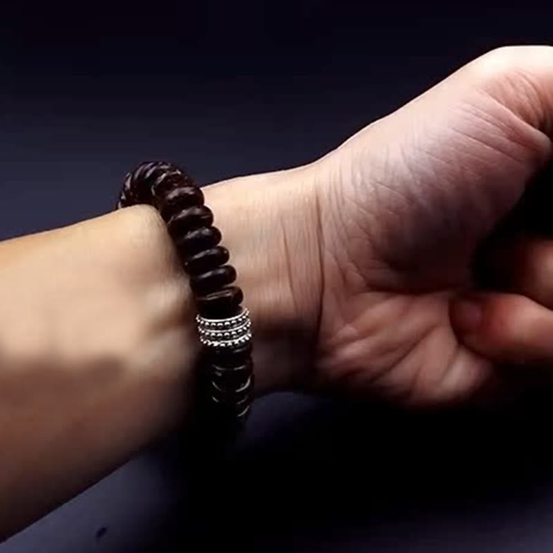 Bracelet tibétain en coquille de noix de coco Om Mani Padme Hum 14-16 cm
