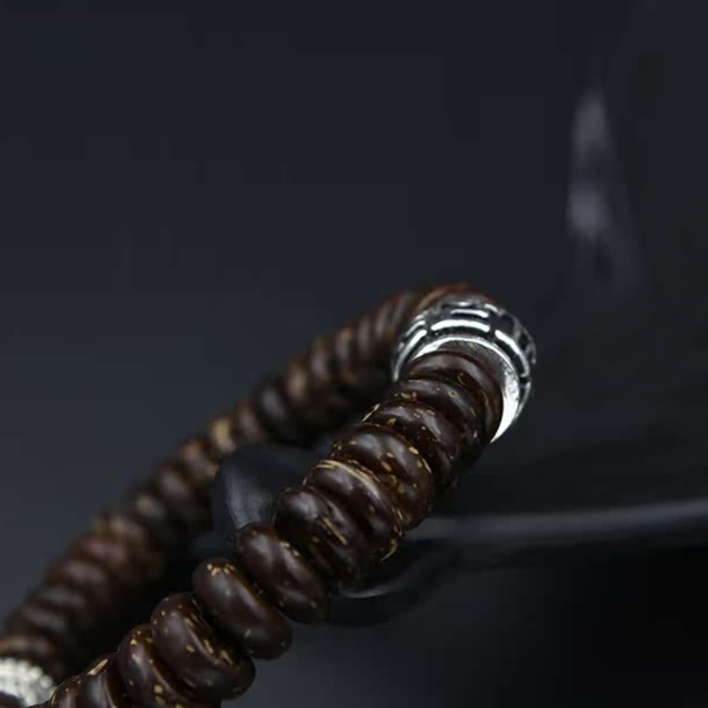Bracelet tibétain en coquille de noix de coco Om Mani Padme Hum 14-16 cm