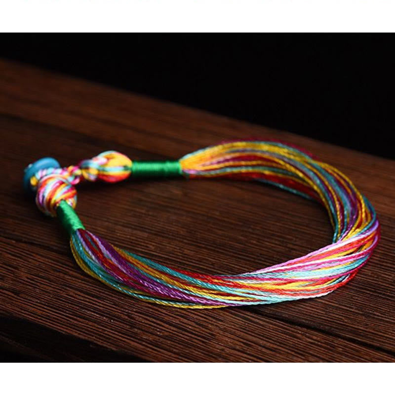 Bracelet de protection tibétain à cinq fils colorés et fil rouge