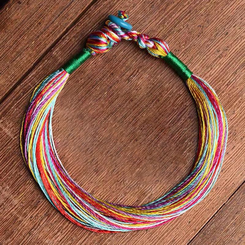 Bracelet de protection tibétain à cinq fils colorés et fil rouge