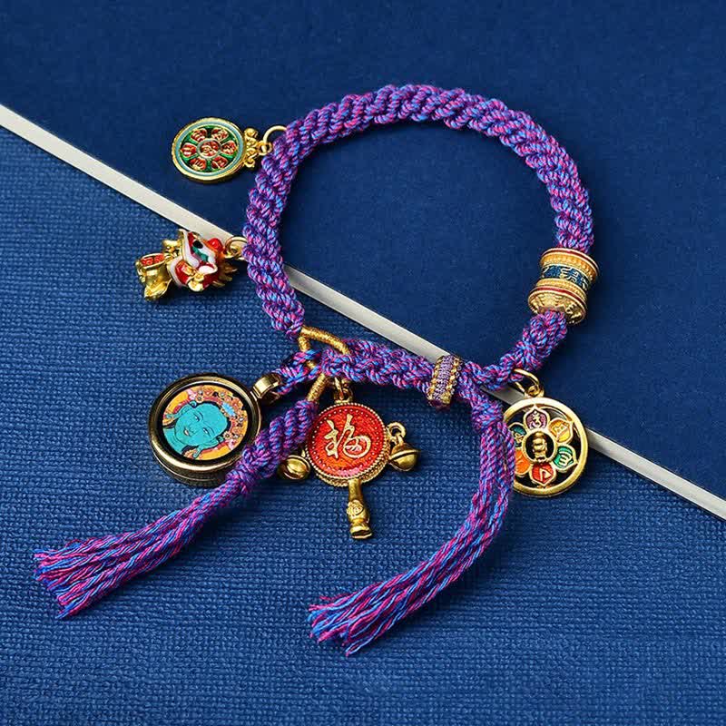 Bracelet tibétain Tara verte et fil rouge Zakiram pour la richesse