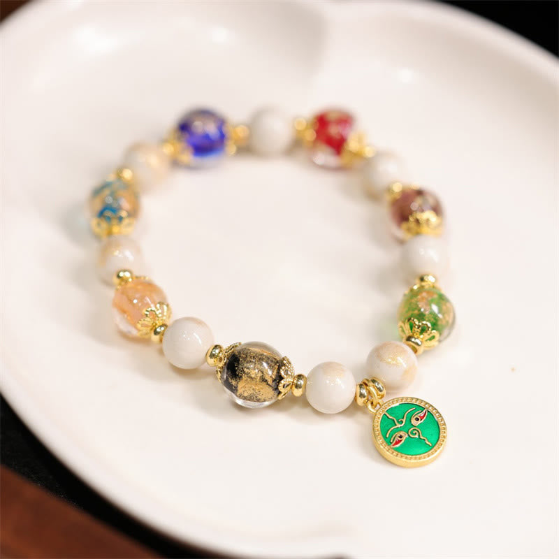 Bracelet tibétain à breloques en verre et porcelaine Liuli pour la richesse