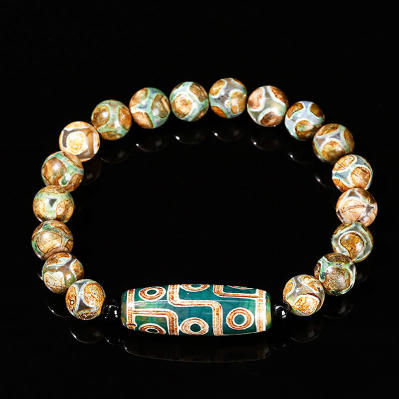 Bracelet de protection spirituelle tibétain en perles dzi à neuf yeux