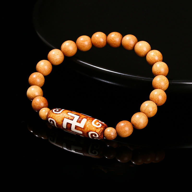 Bracelet de protection spirituelle tibétain en perles dzi à neuf yeux
