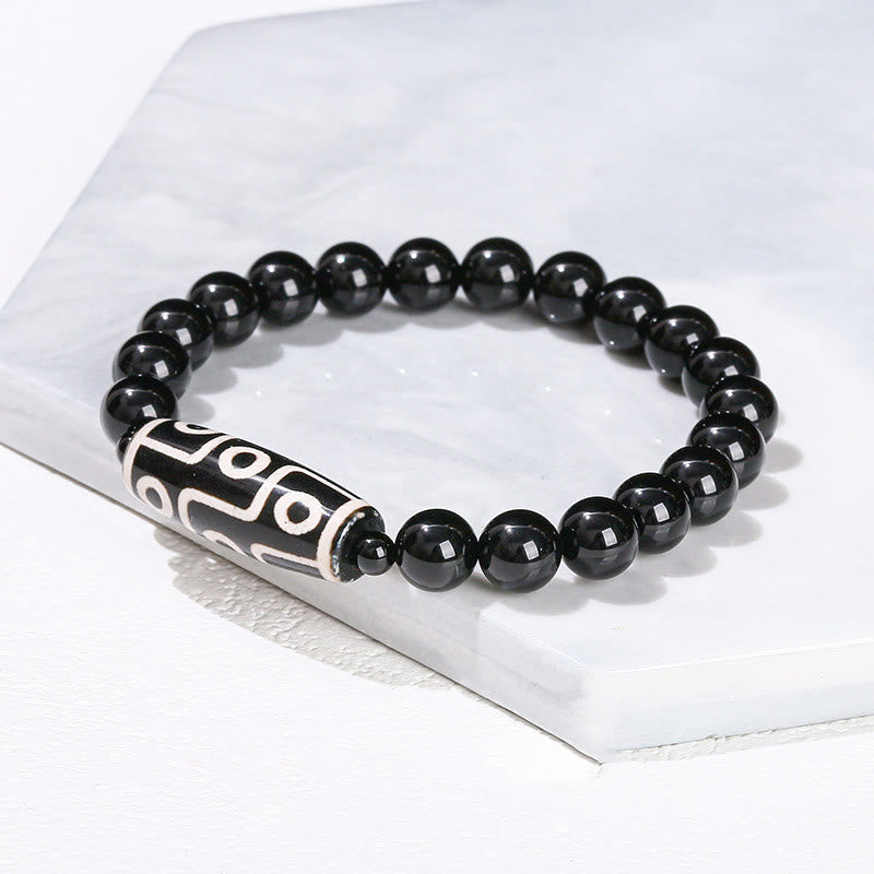 Bracelet de protection spirituelle tibétain en perles dzi à neuf yeux