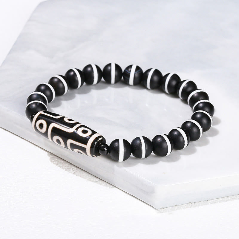 Bracelet de protection spirituelle tibétain en perles dzi à neuf yeux