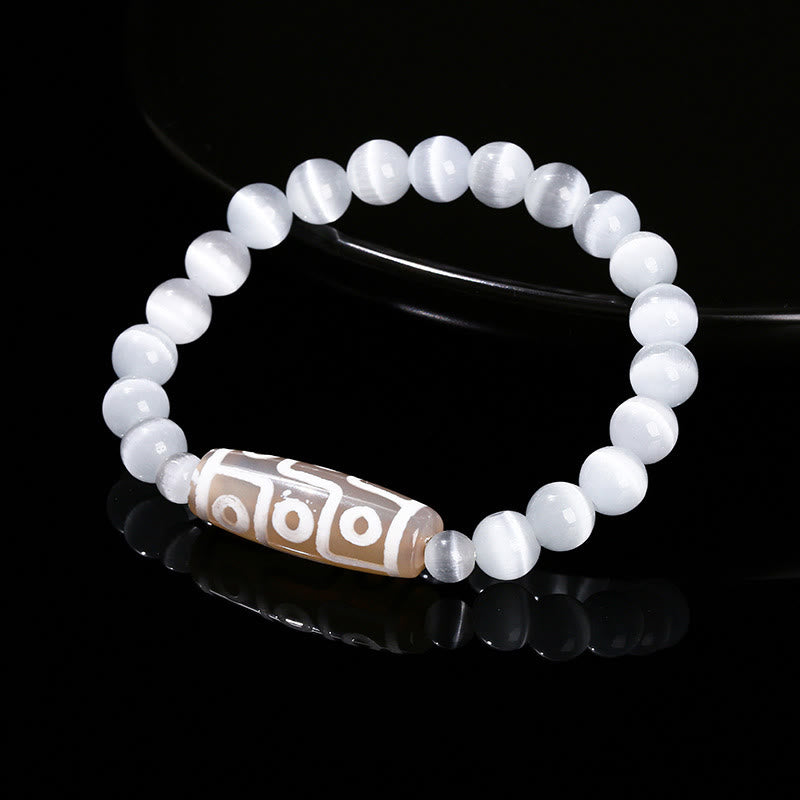 Bracelet de protection spirituelle tibétain en perles dzi à neuf yeux