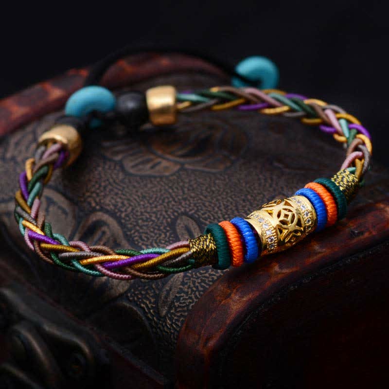 Bracelet tibétain en fil rouge avec pièce de cuivre | Protection et chance