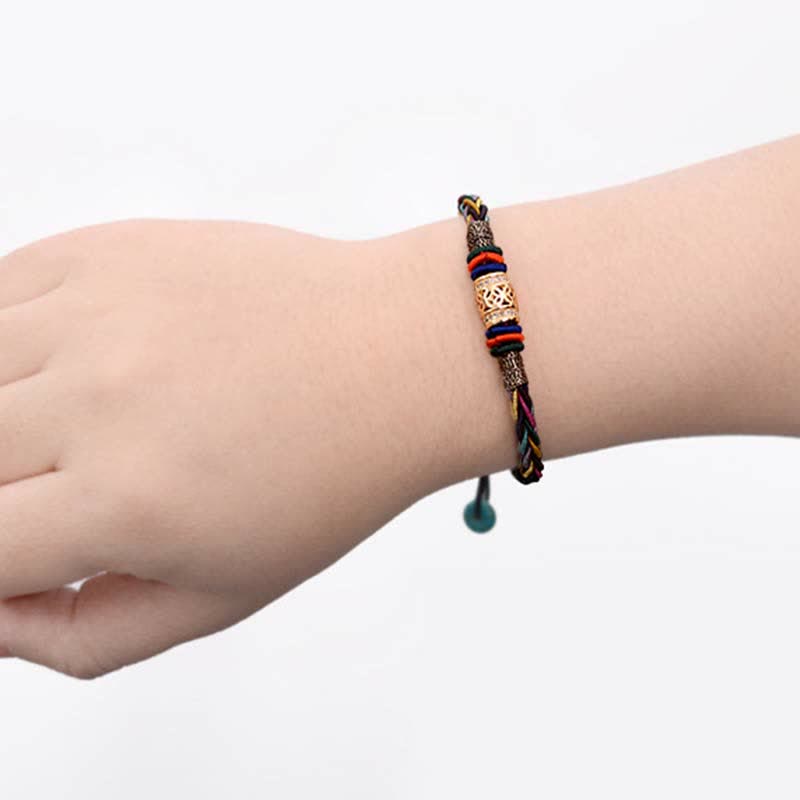 Bracelet tibétain en fil rouge avec pièce de cuivre | Protection et chance