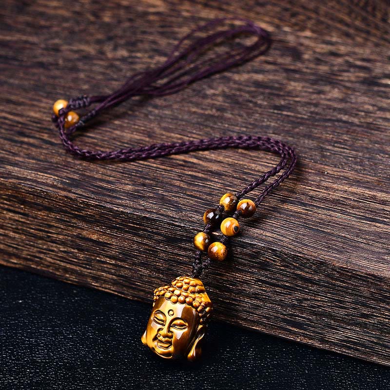 Collier pendentif courage tête de Bouddha œil de tigre