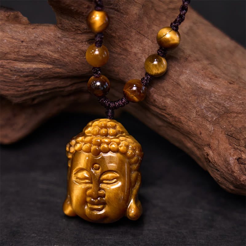 Collier pendentif courage tête de Bouddha œil de tigre