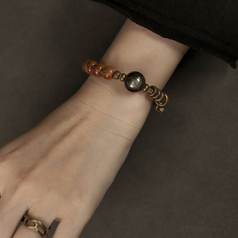 Bracelet de richesse en obsidienne œil de tigre et or brillant Kuka Seed