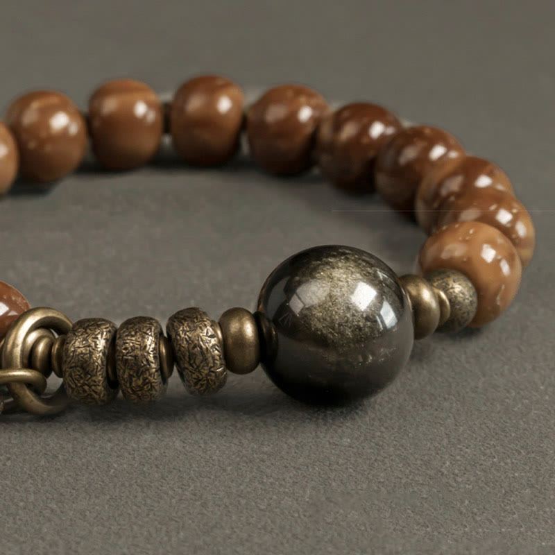 Bracelet de richesse en obsidienne œil de tigre et or brillant Kuka Seed