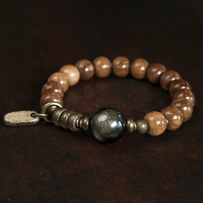 Bracelet de richesse en obsidienne œil de tigre et or brillant Kuka Seed